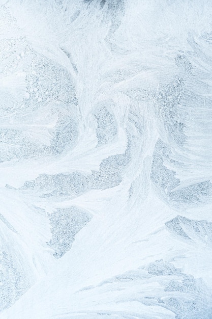 Frostiges Muster Eishintergrund weißer Schneeflockenraureif