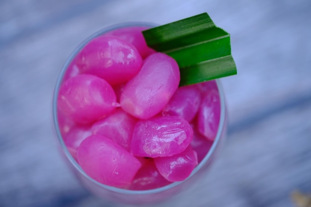 fruta de palma de açúcar. Arenga pinnata. o fruto da palmeira que é feito cristalizado. Sobremesa.