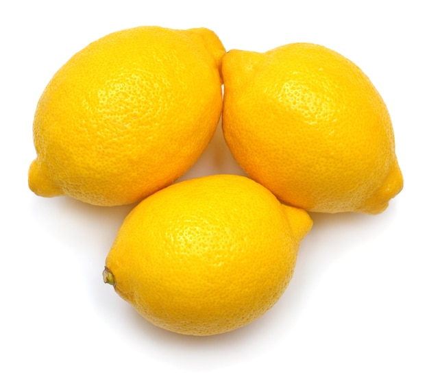 Fruta entera de limón aislada sobre fondo blanco Perfectamente retocada profundidad de campo completa en la foto Vista superior plana