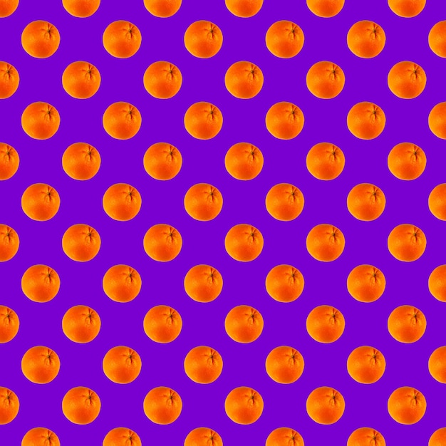 Fruta laranja contra um fundo de tons de roxo Coleção de lindos padrões perfeitos