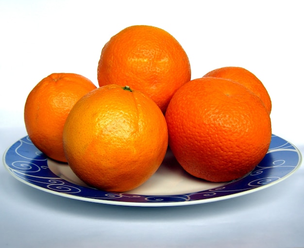 Fruta laranja em um prato