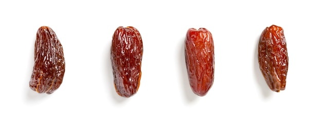 Frutos de tâmaras isolados em closeup branco Frutos secos Dieta saudável