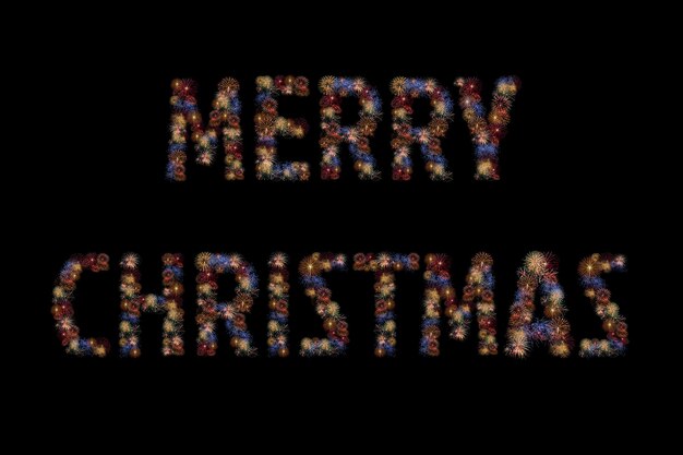 Los fuegos artificiales de colores se encienden formando una palabra de MERRY CHRISTMAS en fondo negro con una exhibición deslumbrante Concepto de fondo de eventos y celebraciones