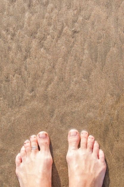 Füße am Strand