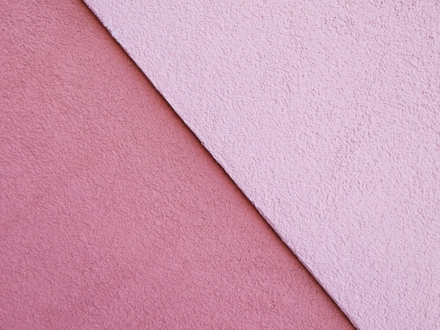 Full-Frame-Aufnahme einer rosa textierten Wand
