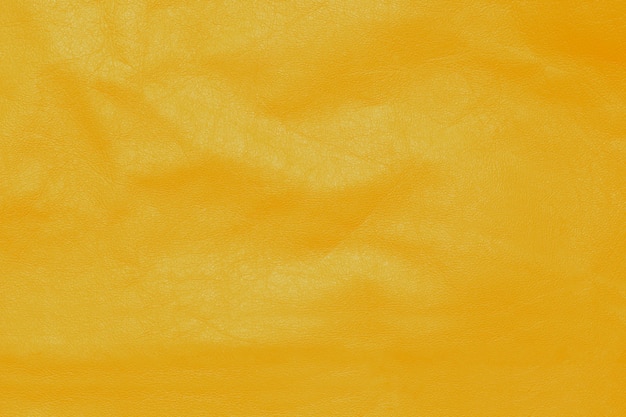 Fundo abstrato com bela textura de couro amarelo.