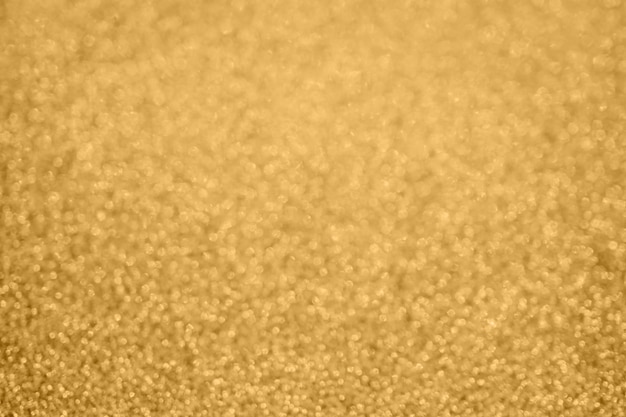 Fundo abstrato com glitter dourado