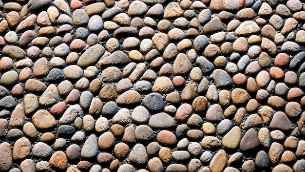 fundo abstrato com pedras redondas de seixo Recreação de férias de férias no conceito de praia