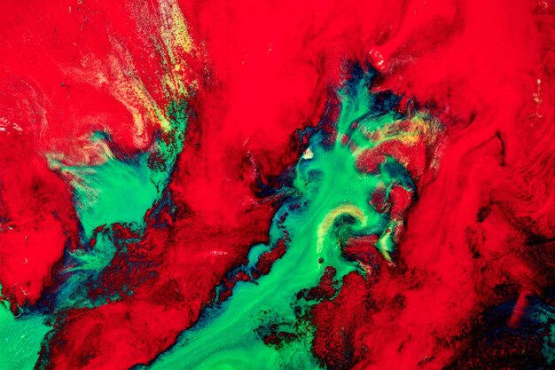 Fundo abstrato criativo multicolorido Tinta de álcool verde vermelha Explosão de manchas e pinceladas de textura de mármore de luxo de tinta