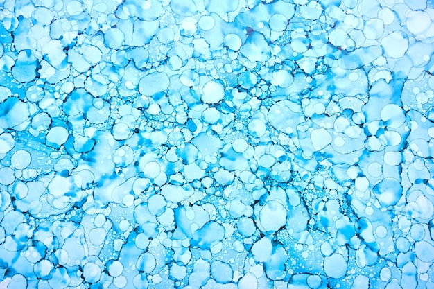 Fundo abstrato da pintura azul. Bolhas de água gotas manchas salpicos textura padrão