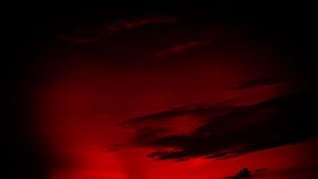 Fundo abstrato da textura do céu vermelho Nuvem Onda Tempestade Fiery Pôr do sol Novo design Pano de fundo Nascer do sol da noite Belo efeito preto escuro Padrão para calibração Feriado Feliz Natal Feliz Ano Novo Conceito