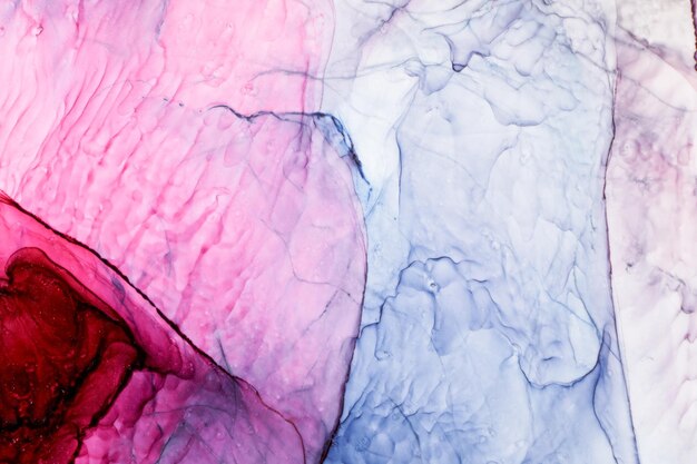 Fundo abstrato de aquarela azul rosa Manchas de tinta e manchas onduladas em papel de parede de arte líquida de luxo de água