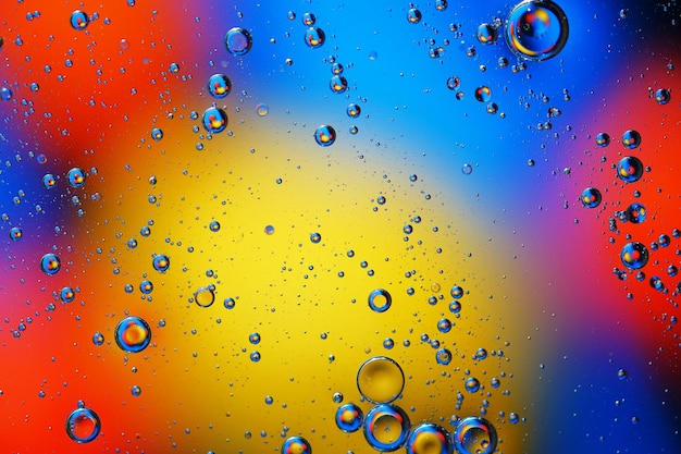 Fundo abstrato de bolhas coloridas na superfície da água e do petróleo para seu projeto.