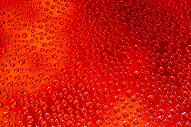 Foto fundo abstrato de gotas de água na superfície do vidro