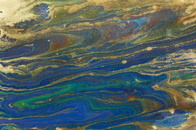 Fundo abstrato de mármore azul e dourado. padrão líquido da marinha com glitter dourado.