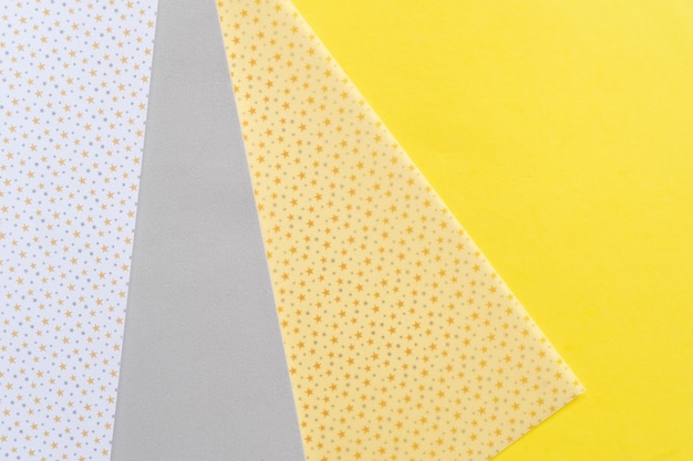 Fundo abstrato e moderno de papel feito à mão nas melhores cores cinza e amarelo iluminador