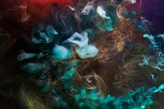 Fundo abstrato espumante multicolorido luxo ouro escuro fumaça tinta acrílica explosão subaquática tinta cósmica turbilhão