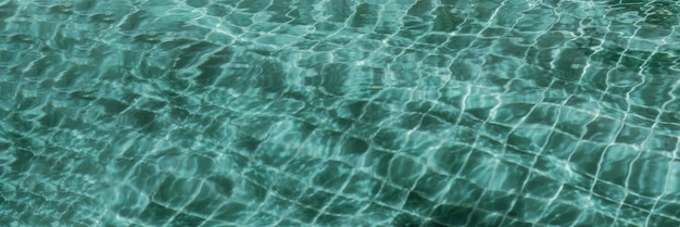 Fundo abstrato Padrões Água rasgada Superfície piscina Reflexo de luz Azul verde vibrante