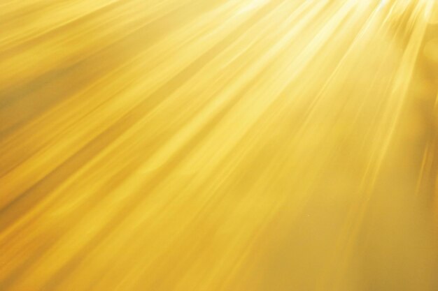 Fundo amarelo abstrato com raios de sol e efeito de brilho da lente