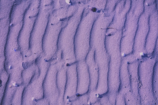 Fundo arenoso ondulado abstrato Textura de areia de praia