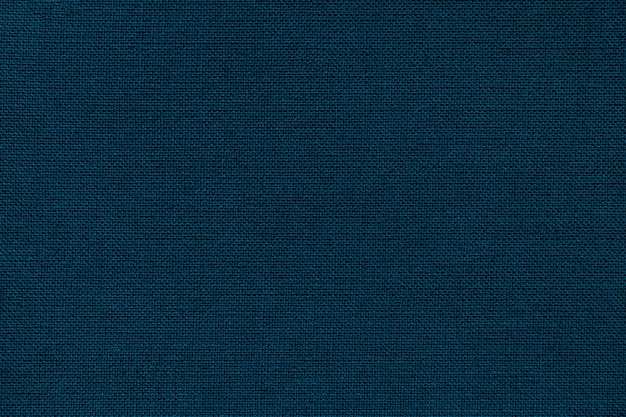 Fundo azul marinho de um material têxtil com padrão de vime