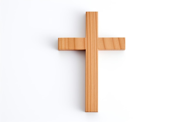 Fundo branco com pequena cruz de madeira isolada