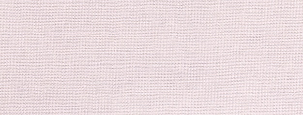 Fundo branco de um material têxtil com padrão de vime closeup Estrutura do tecido marfim com textura natural Pano de fundo