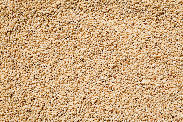 Foto fundo cheio de grãos de quinoa bege papel de parede