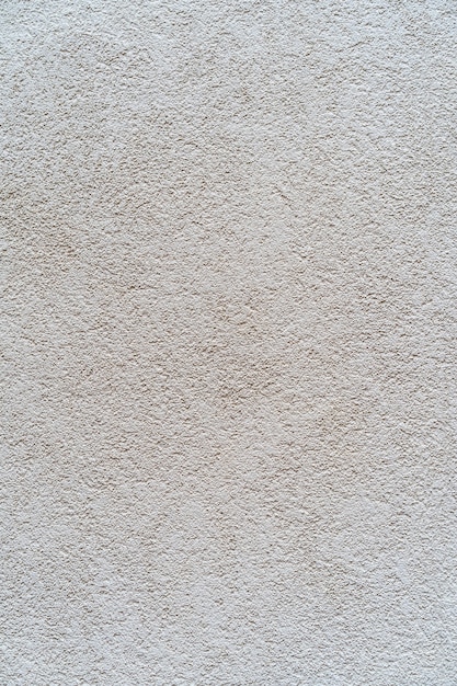 Fundo cinza-bege claro de gesso decorativo de textura fina. como pano de fundo natural. foto de alta qualidade