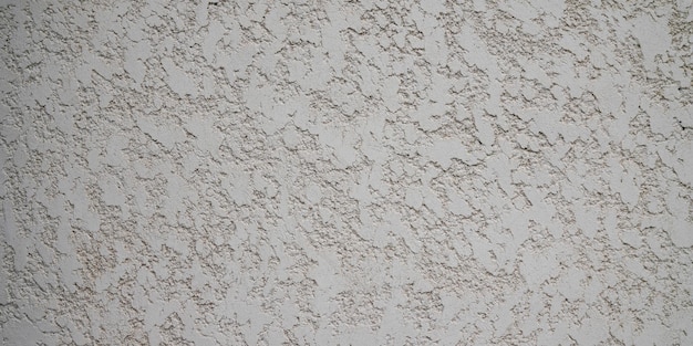 Fundo cinza fachada branca em casa parede de concreto sem costura pintada textura de pedra cinza