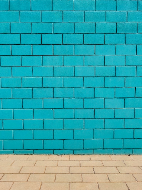Fundo da parede de tijolo azul