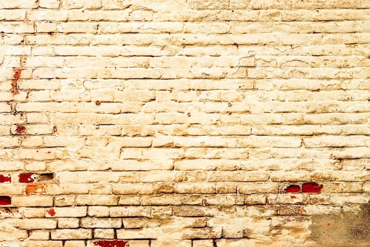 Foto fundo da parede de tijolo de textura. textura de tijolo com arranhões e rachaduras