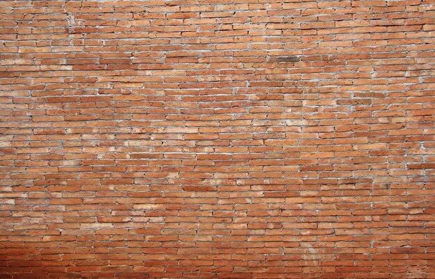 Fundo da parede de tijolo vermelho. textura de pedra.