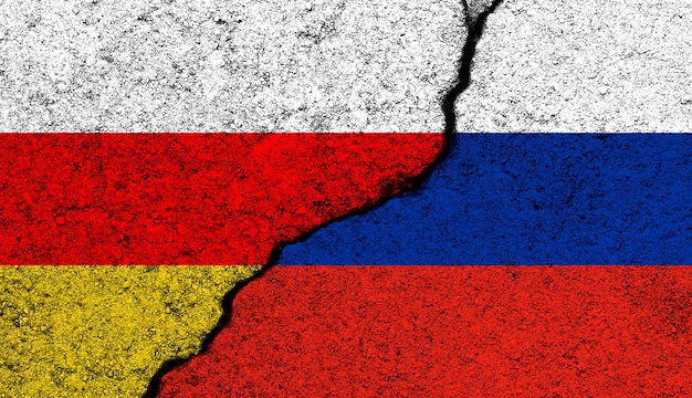 Fundo das bandeiras da Ossétia do Sul e da Rússia Foto do conceito de independência da guerra do conflito militar