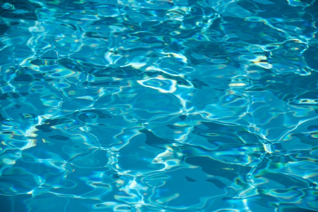 Fundo de água da piscina abstrato de onda azul ou fundo de textura de água ondulada