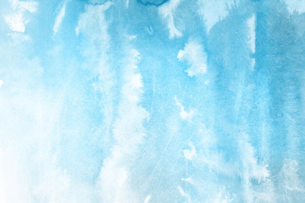 Fundo de aquarela azul de inverno fosco pintado em papel branco