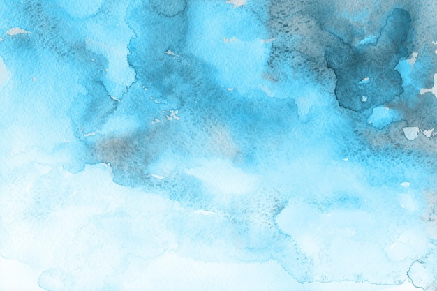 Fundo de aquarela azul de inverno fosco pintado em papel branco