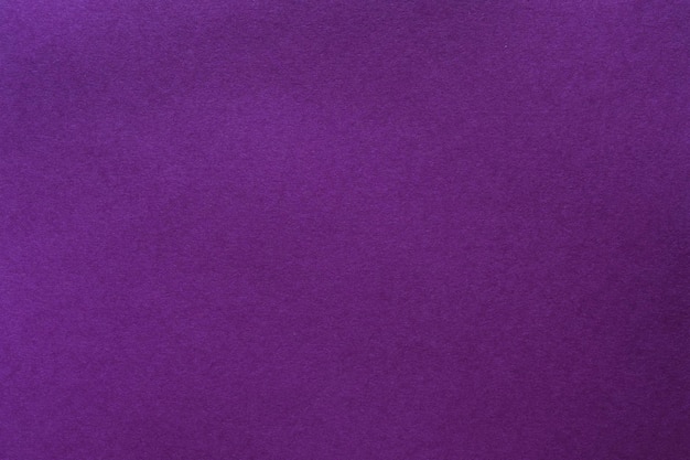 Fundo de arte abstrata textura de feltro roxo têxtil de lã de cor sólida espaço vazio