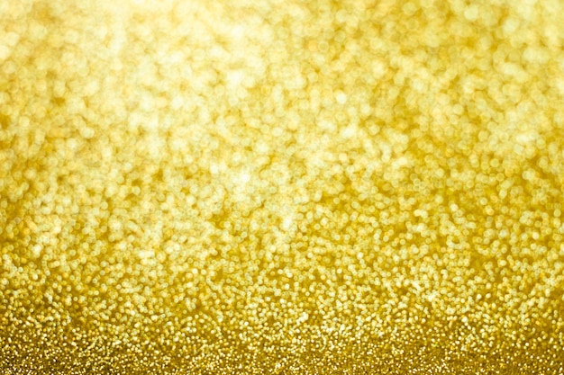 Fundo de brilho dourado abstrato Fundo de bokeh dourado brilhante de Natal