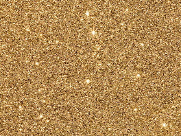 Fundo de brilho dourado. textura de brilho. fundo abstrato para feriado de ano novo ou natal