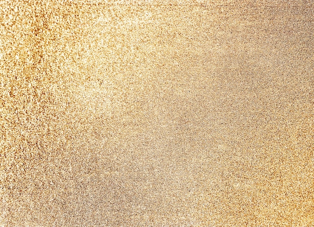 Fundo de brilho dourado Textura de metal dourado Luxo brilhante nas costas