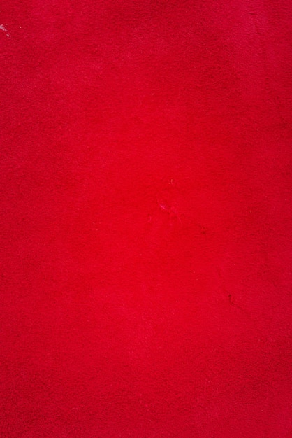 Fundo de couro genuíno de camurça vermelha fundo vermelho de veludo closeup foto