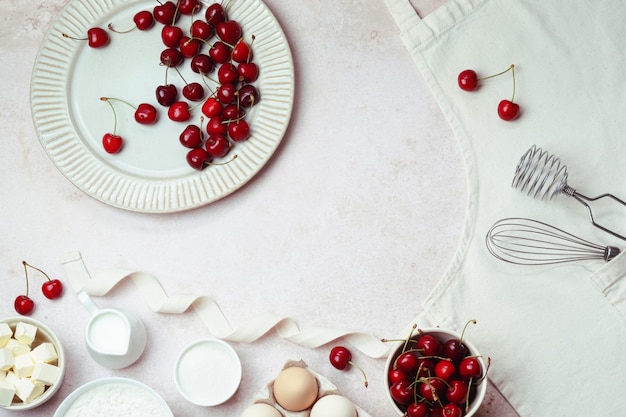 Fundo de cozimento de cozimento de verão com ingredientes cerejas ingredientes de cozimento utensílios de cozinha