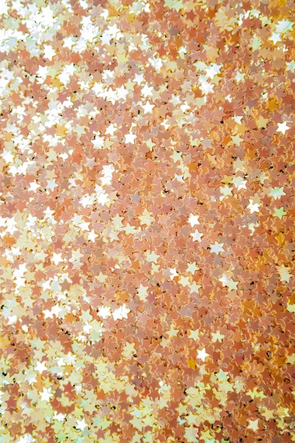 Fundo de estrelas de brilho de natal de brilho dourado