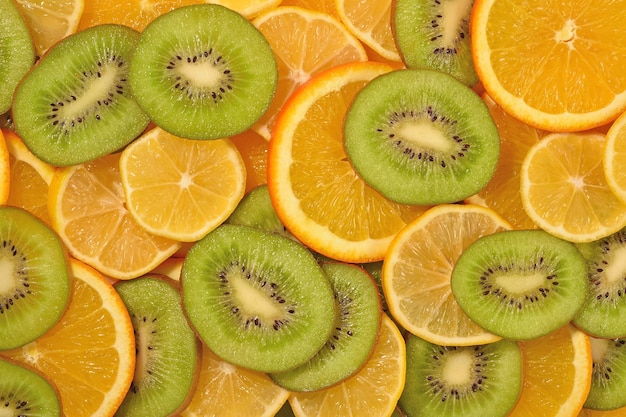 Fundo de fatias de laranja, limão e kiwi