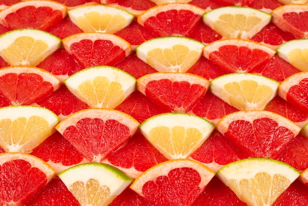 Foto fundo de fatias suculentas de pomelo e toranja.