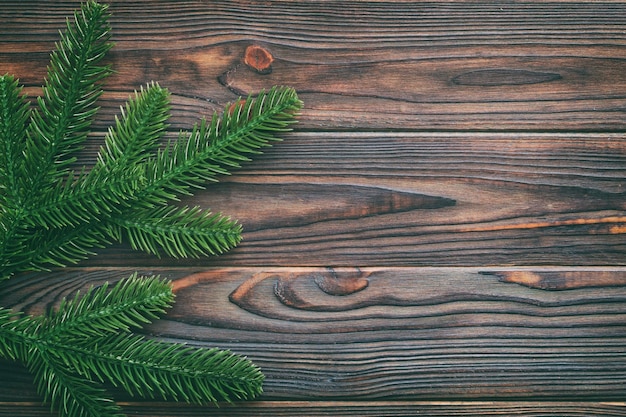 Fundo de férias de Natal com espaço de cópia para texto publicitário Ramos de abeto sobre fundo de cor Vista superior plana