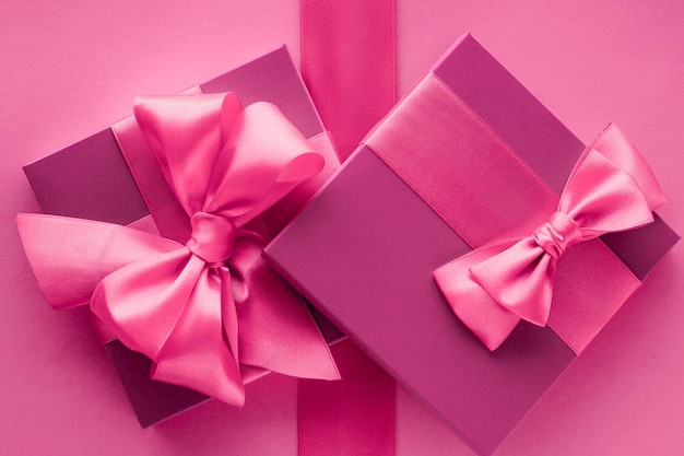 Fundo de flatlay estilo feminino de caixas de presente rosa