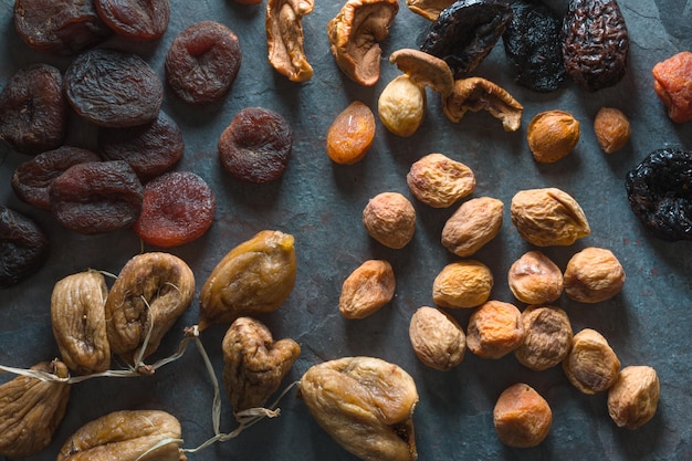 Fundo de frutas secas, damascos secos, figos e peras