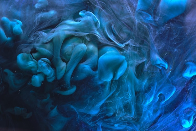 Fundo de fumaça abstrato de cor azul Misture tinta de álcool maquete de arte líquida criativa com espaço de cópia Ondas de tinta acrílica debaixo d'água